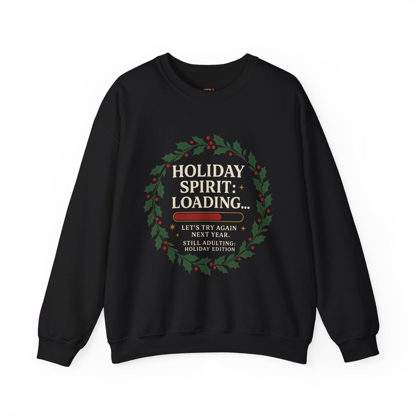 Black crewneck sweatshirt with green and red text that says “Holiday Spirit: Loading… Let’s Try Again Next Year. Still Adulting: Holiday Edition.”