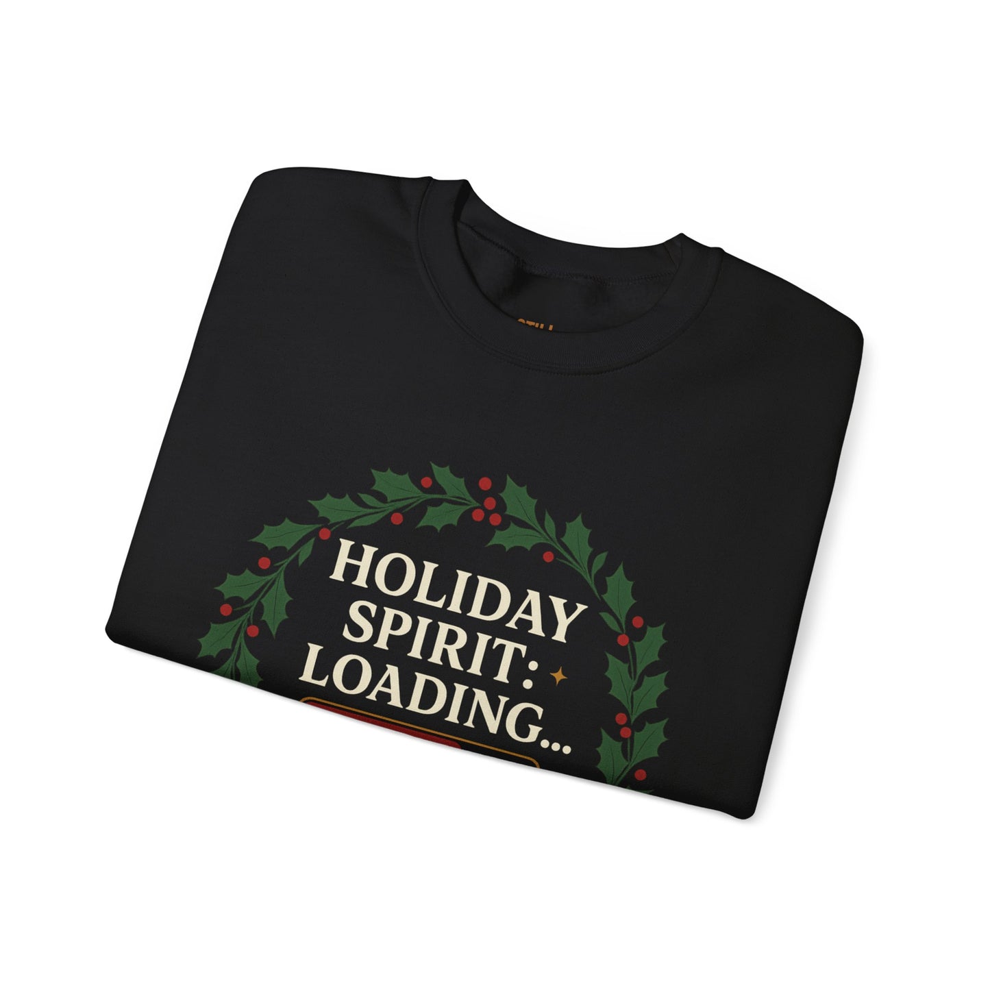 Black crewneck sweatshirt with green and red text that says “Holiday Spirit: Loading… Let’s Try Again Next Year. Still Adulting: Holiday Edition.”